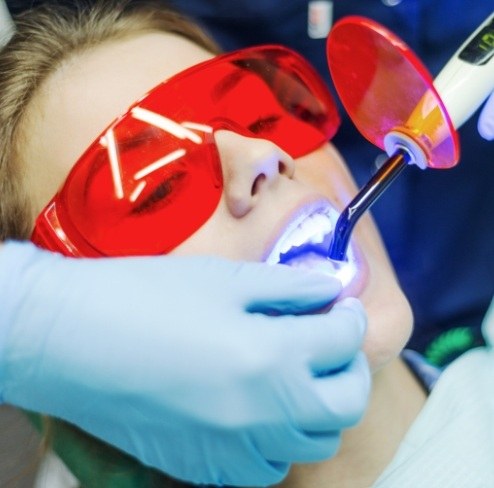 Patient receiving dental bonding