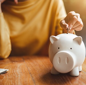 piggy bank representing cost of emergency dentistry in Port Charlotte 