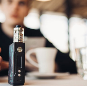 Patient in Port Charlotte reaching for a vape pen