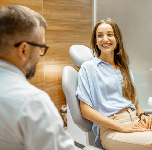 woman in exam for smile makeover in Port Charlotte