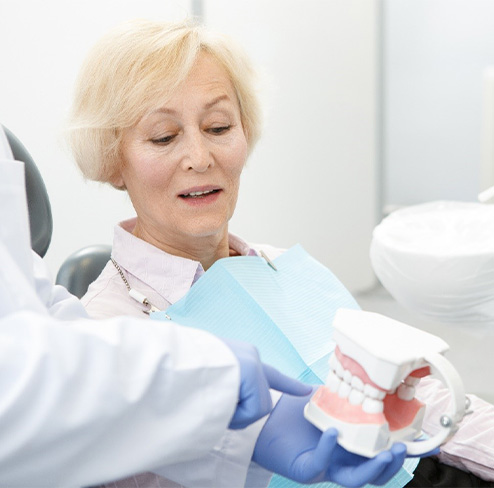 Man with dentures smiling