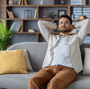a man relaxing on a couch