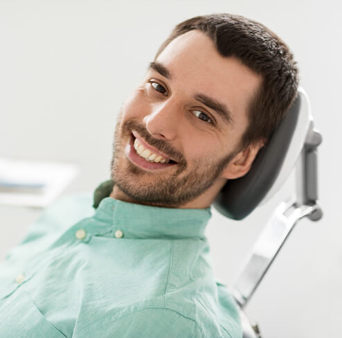 Man smiling during preventive dentistry visit