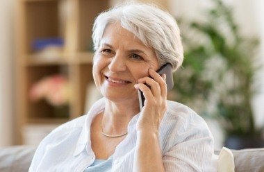 Woman calling to schedule an emergency dentistry visit
