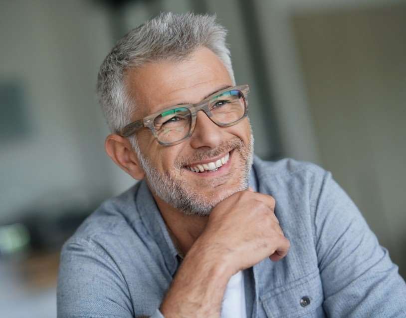 Man smiling after T M J therapy