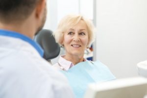 Older woman smiling during dental checkup
