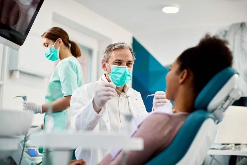 Patient talking to their dentist